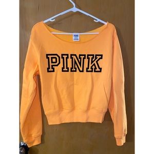 (Orange) PINK off-shoulder sweater. Size S